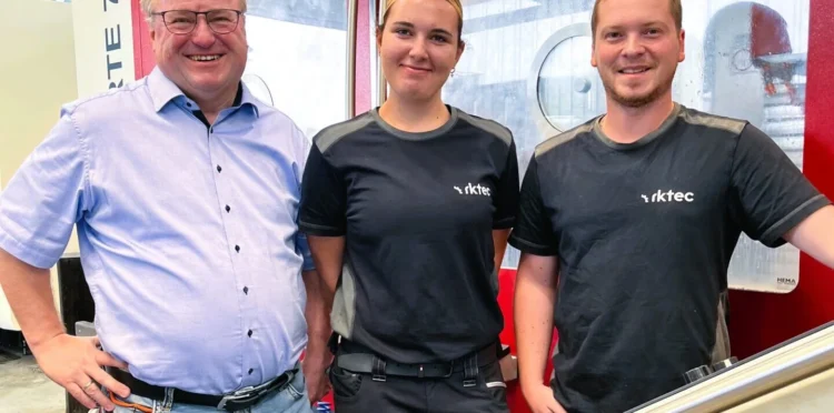 Company owner Richard Klostermeier, apprentice Emily Fichtl, and trainer Martin Prechtl